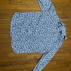 Floral button up shirt.